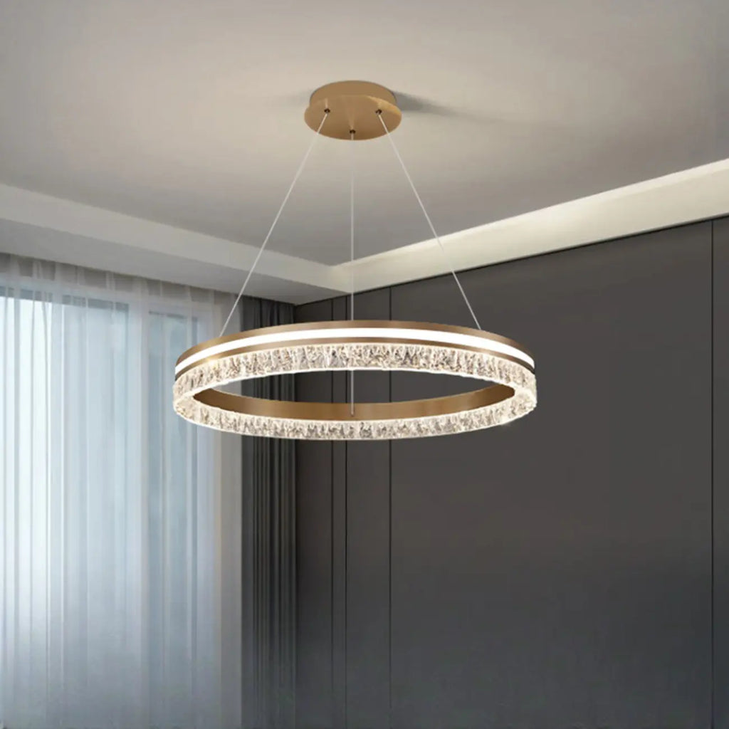 Lustre circulaire moderne en métal doré à LED