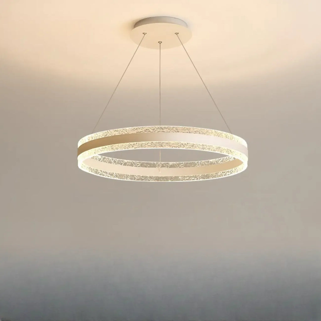 Lustre circulaire moderne en métal doré à LED