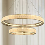 Lustre élégant à LED en cristal et anneaux dorés de luxe