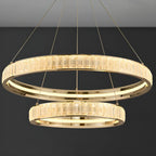 Lustre élégant à LED en cristal et anneaux dorés de luxe