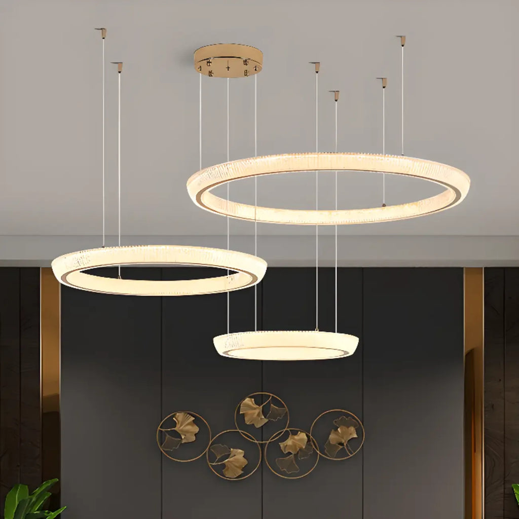 Lustre LED glamour en cristal doré à plusieurs cercles