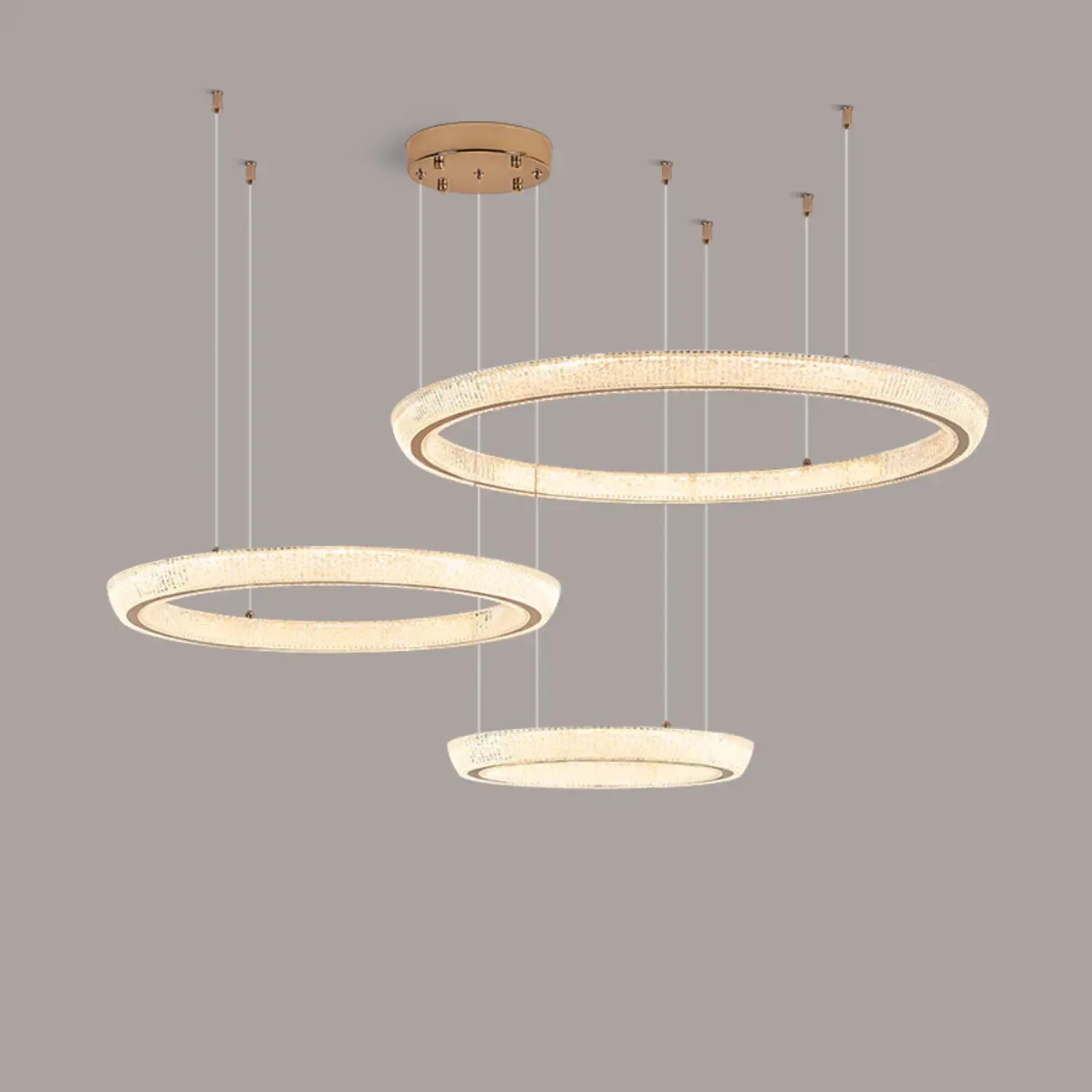 Lustre LED glamour en cristal doré à plusieurs cercles