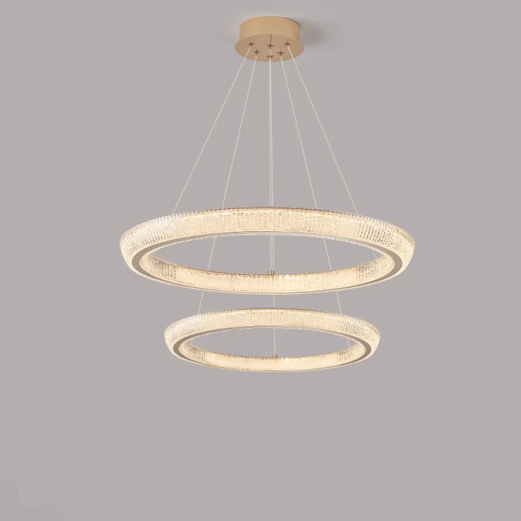 Lustre LED glamour en cristal doré à plusieurs cercles