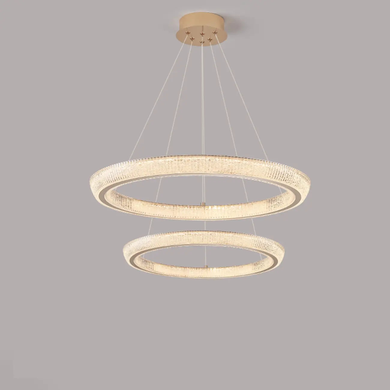 Lustre LED glamour en cristal doré à plusieurs cercles