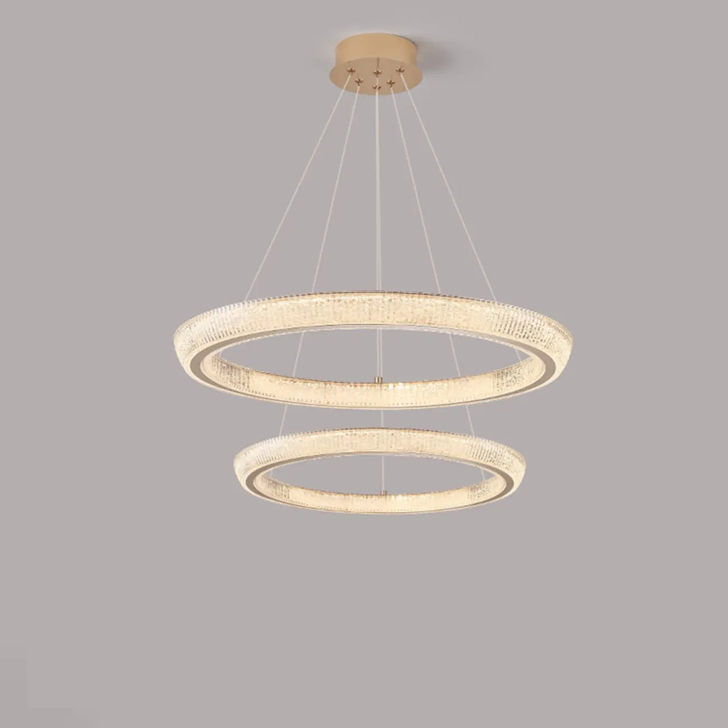 Lustre LED glamour en cristal doré à plusieurs cercles