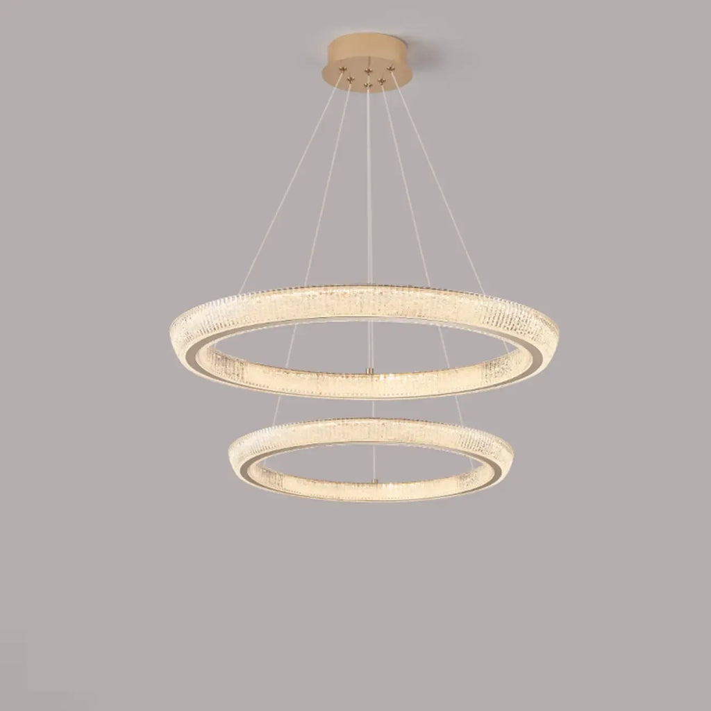 Lustre LED glamour en cristal doré à plusieurs cercles