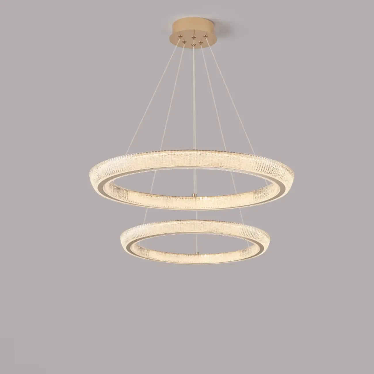 Lustre LED glamour en cristal doré à plusieurs cercles