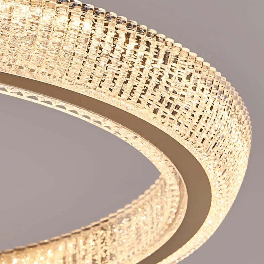 Lustre LED glamour en cristal doré à plusieurs cercles