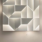 Applique murale LED géométrique en métal blanc Art Decor avec télécommande