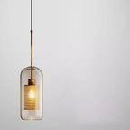 Suspension moderne en verre transparent pour îlot de cuisine, structure en métal.