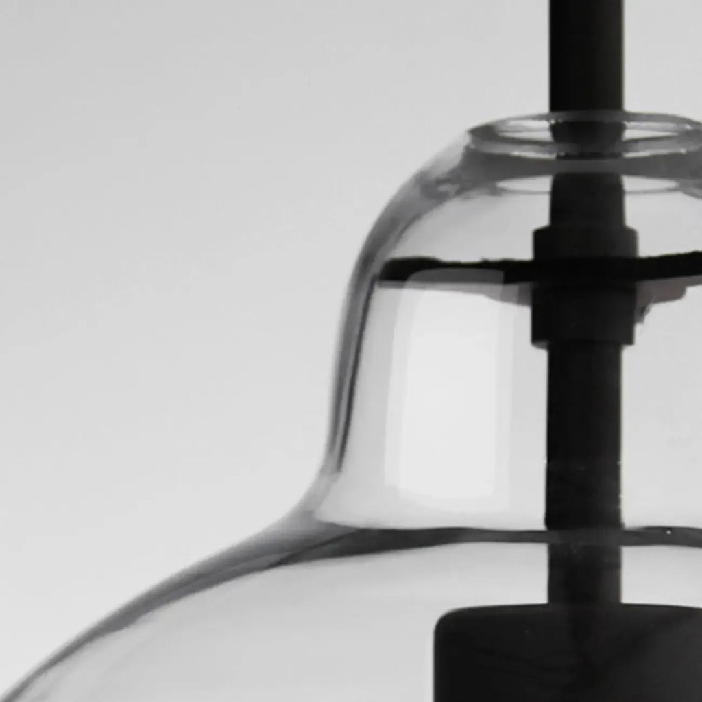 Suspension moderne en verre transparent pour îlot de cuisine, structure en métal.