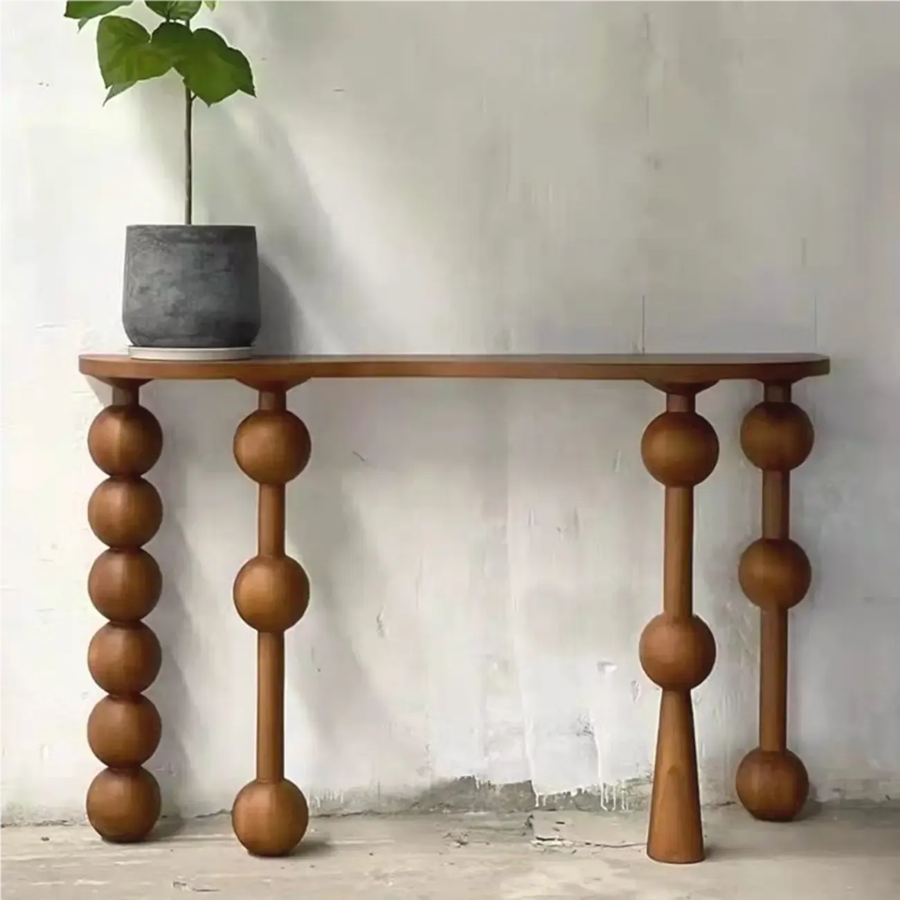Console d'entrée artistique en noyer avec pieds tournés