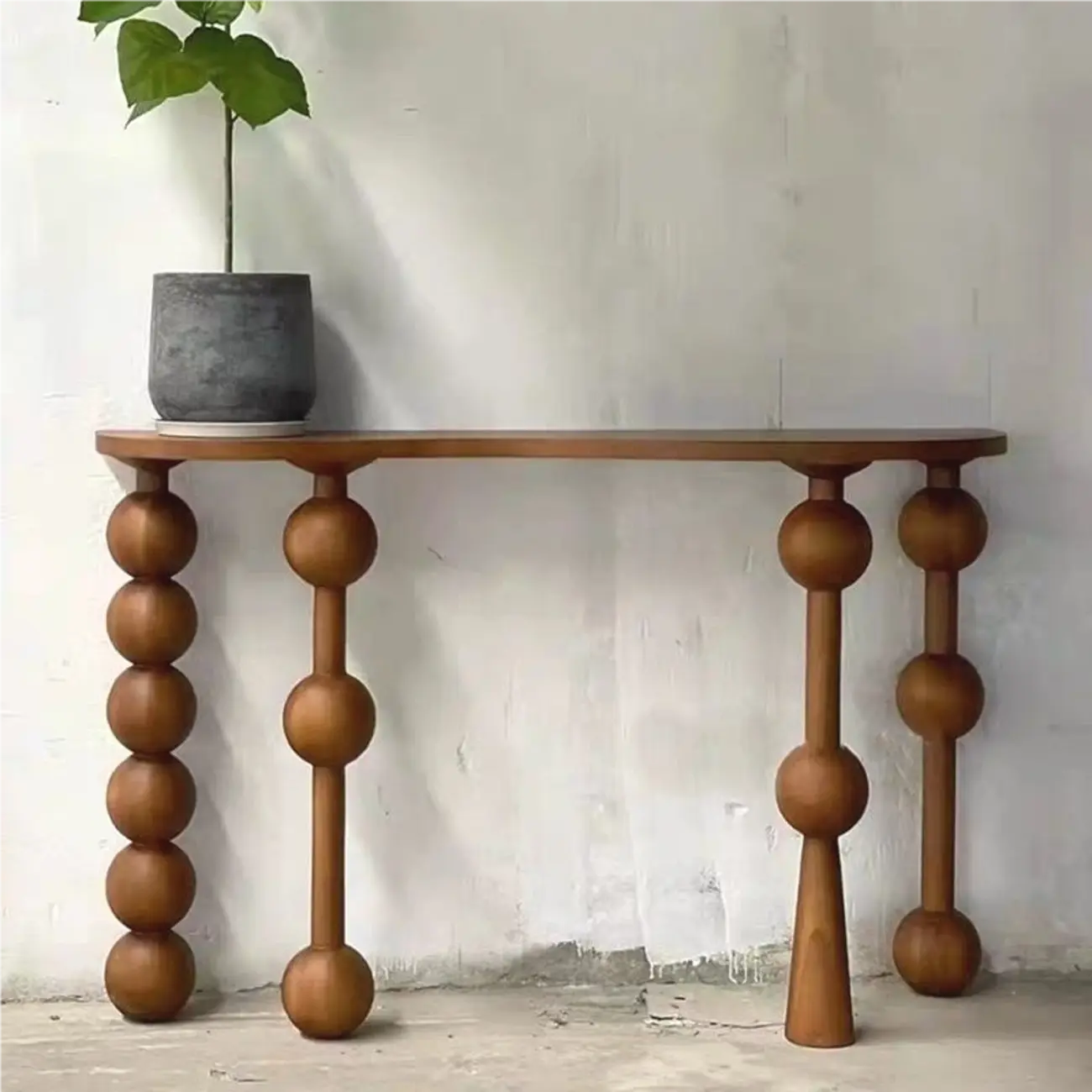 Console d'entrée artistique en noyer avec pieds tournés