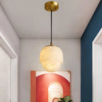 Suspension géométrique en pierre blanche à 1 lumière