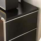 Bibliothèque compacte à 3 niveaux en bois et acier, de couleur noire.