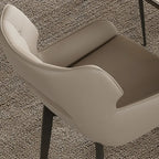 Chaise de salle à manger moderne en similicuir avec dossier ouvert et accoudoirs