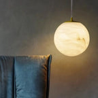 Suspension carrée en pierre dorée à 1 lumière