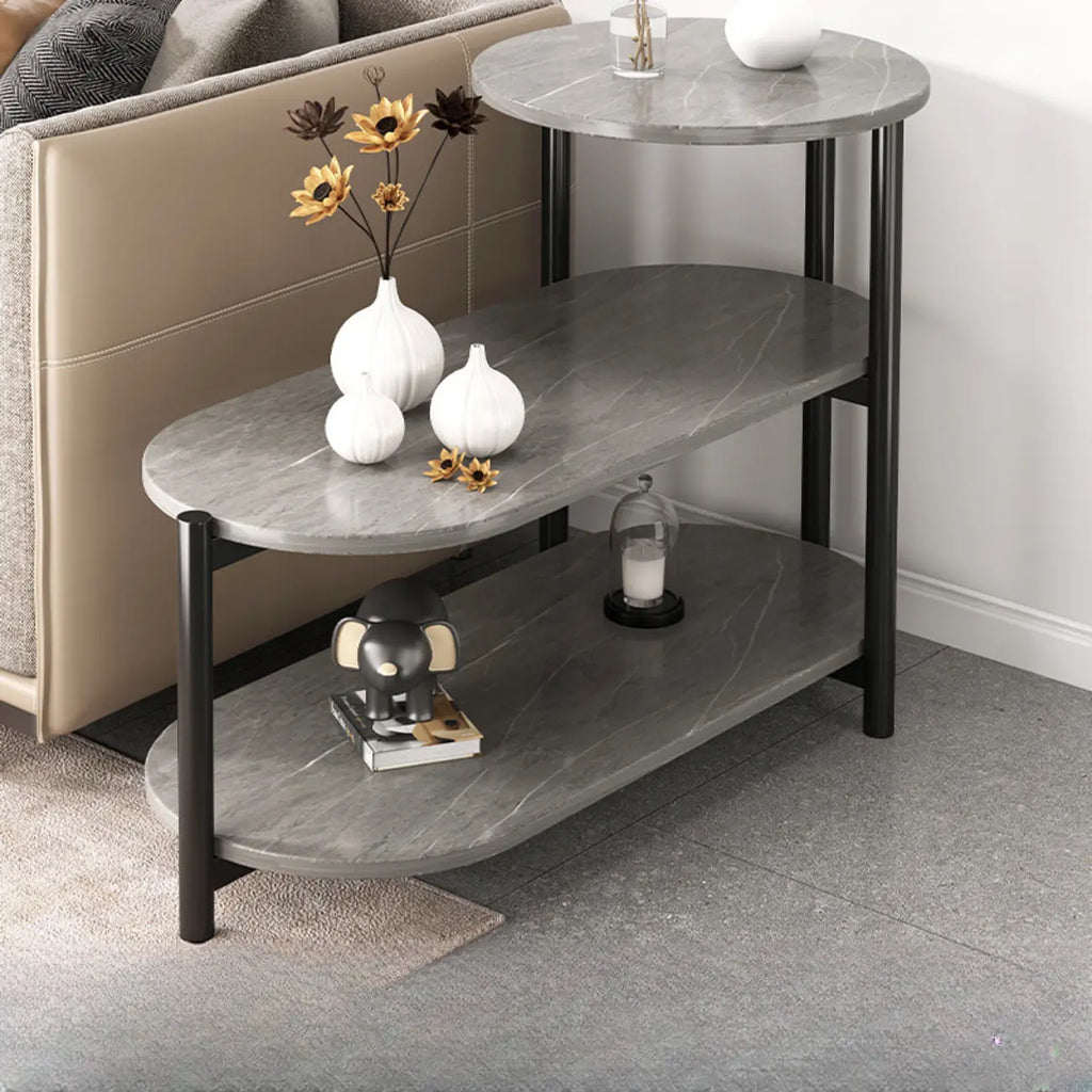 Table d'appoint ovale noire à 3 niveaux en bois avec pieds en métal