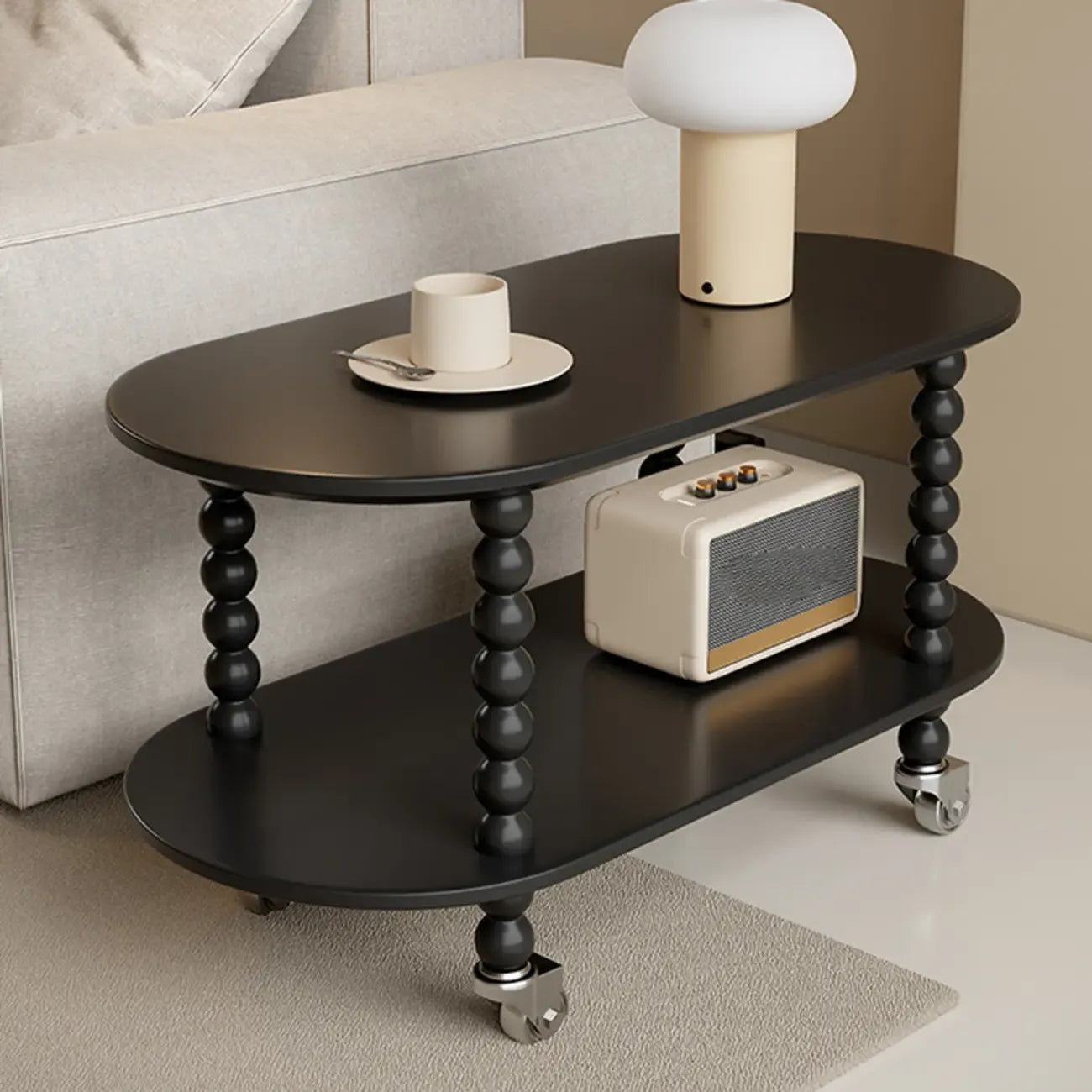 Table d'appoint roulante ovale noire en bois à 2 niveaux avec rangement