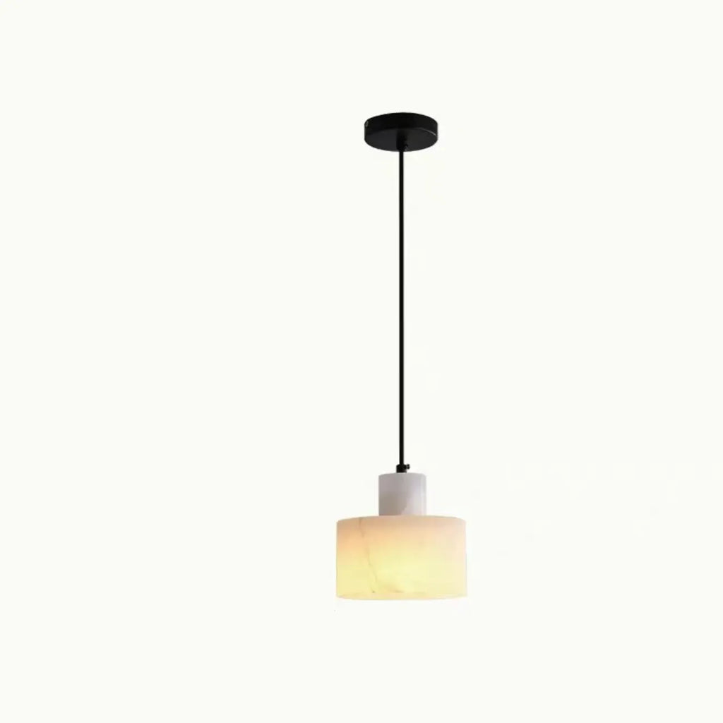 Suspension cylindrique en pierre noire