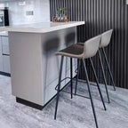 Tabouret de bar à dossier bas et assise en cuir marron