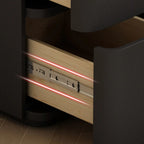 Comodino nero stretto in legno con 3 cassetti e inserti in pelle
