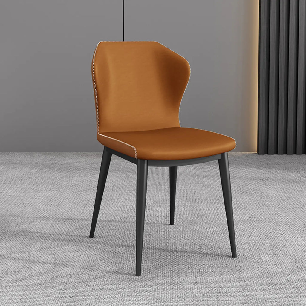 Chaise de salle à manger moderne en similicuir avec dossier à oreilles et pieds en acier