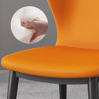 Chaise de salle à manger moderne en similicuir avec dossier à oreilles et pieds en acier