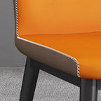 Chaise de salle à manger moderne en similicuir avec dossier à oreilles et pieds en acier