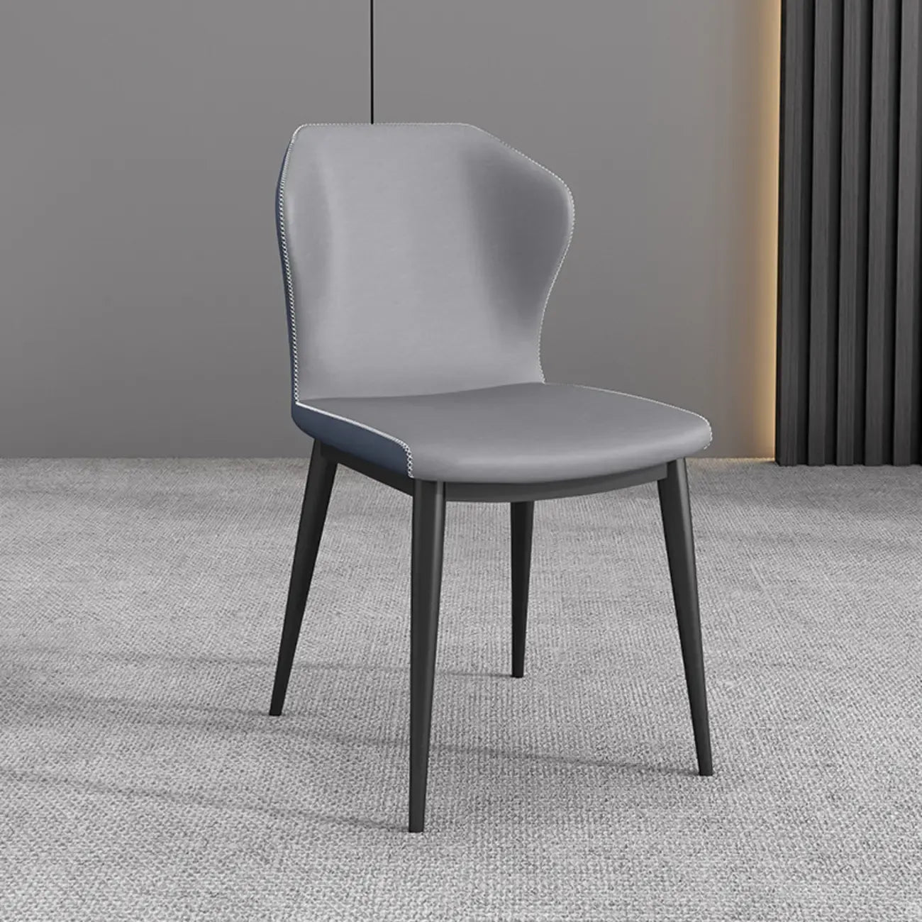 Chaise de salle à manger moderne en similicuir avec dossier à oreilles et pieds en acier
