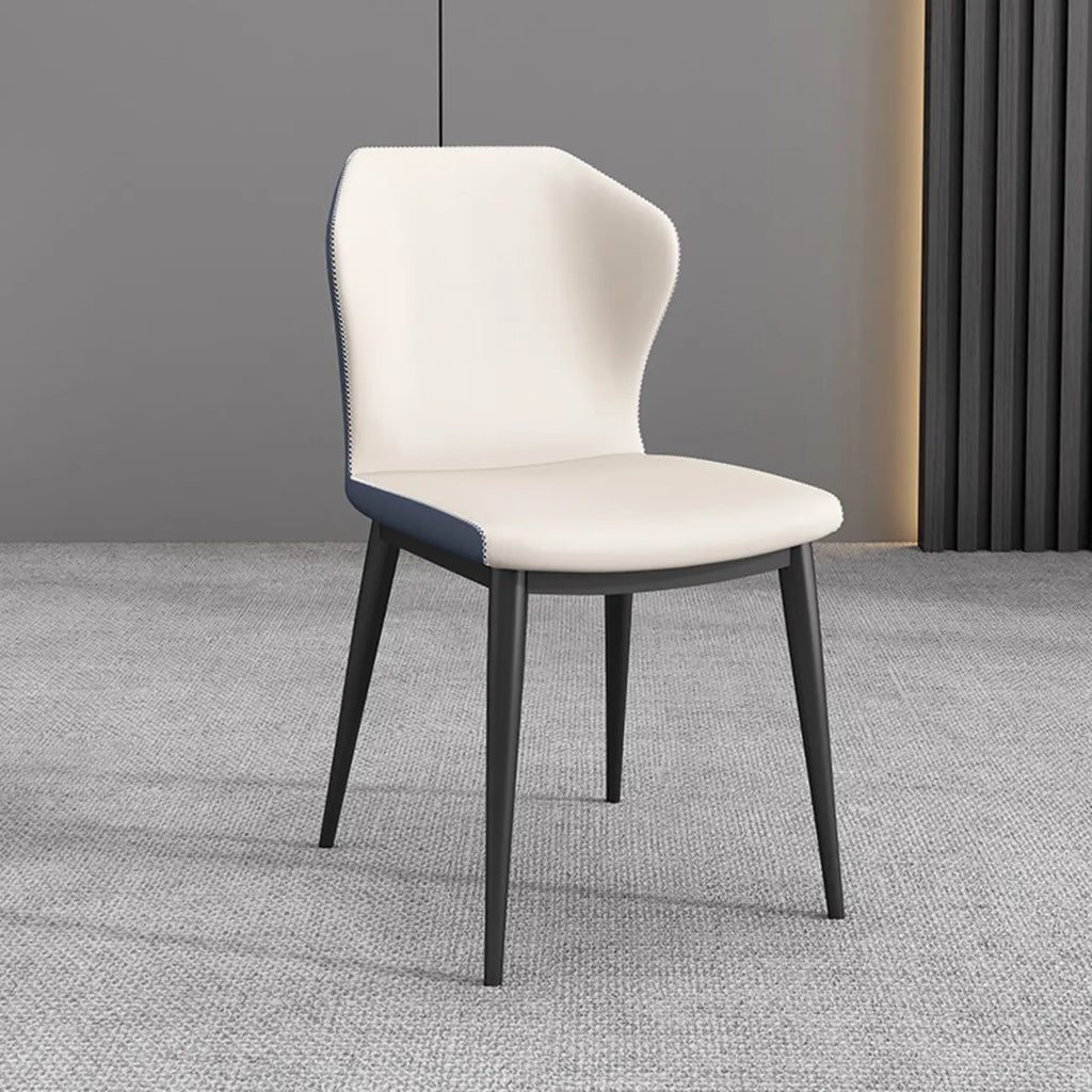 Chaise de salle à manger moderne en similicuir avec dossier à oreilles et pieds en acier