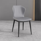 Chaise de salle à manger moderne en similicuir avec dossier à oreilles et pieds en acier