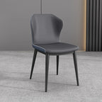 Chaise de salle à manger moderne en similicuir avec dossier à oreilles et pieds en acier