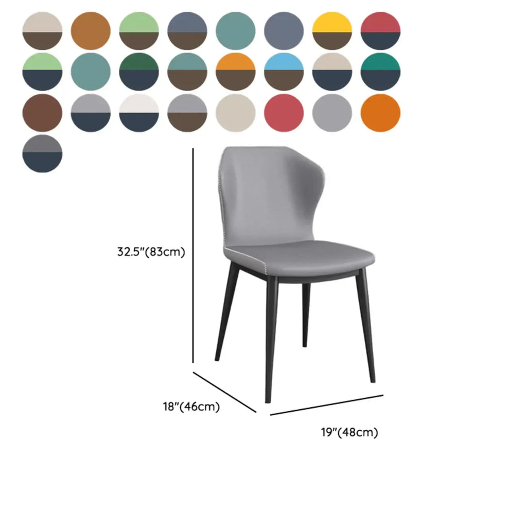 Chaise de salle à manger moderne en similicuir avec dossier à oreilles et pieds en acier