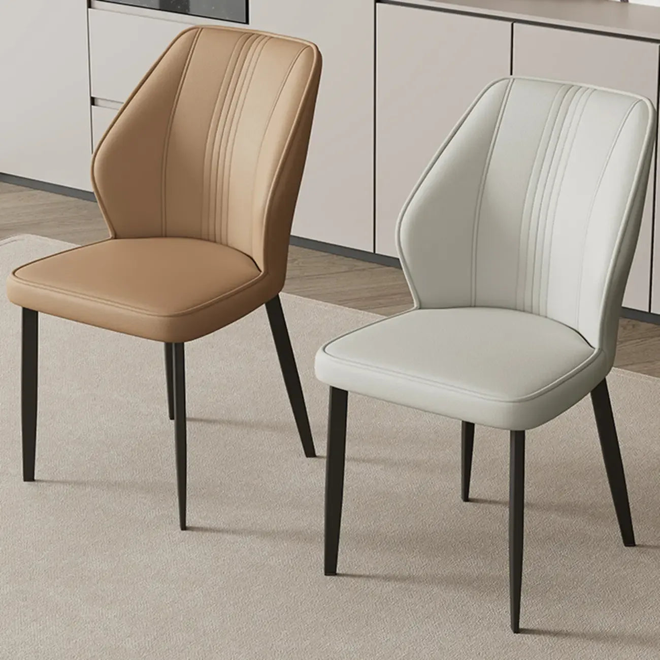 Chaise de salle à manger moderne à oreilles, revêtue de similicuir et dotée de pieds en métal