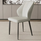 Chaise de salle à manger moderne à oreilles, revêtue de similicuir et dotée de pieds en métal