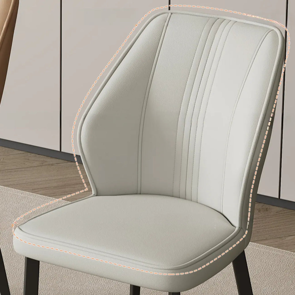 Chaise de salle à manger moderne à oreilles, revêtue de similicuir et dotée de pieds en métal