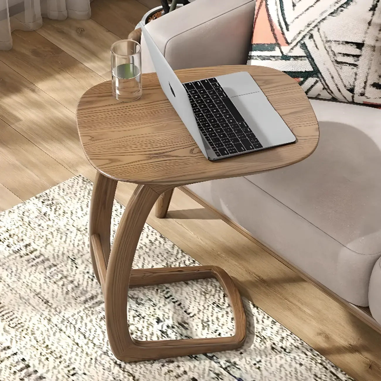 Table d'appoint minimaliste en bois naturel en forme de C pour salon