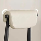Chaise de salle à manger élégante à dossier bas, revêtue de similicuir.