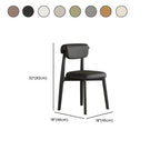 Chaise de salle à manger élégante à dossier bas, revêtue de similicuir.