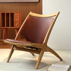 Fauteuil minimaliste en cuir marron selle pour salon