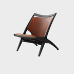 Fauteuil minimaliste en cuir marron selle pour salon