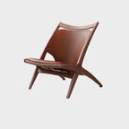 Fauteuil minimaliste en cuir marron selle pour salon