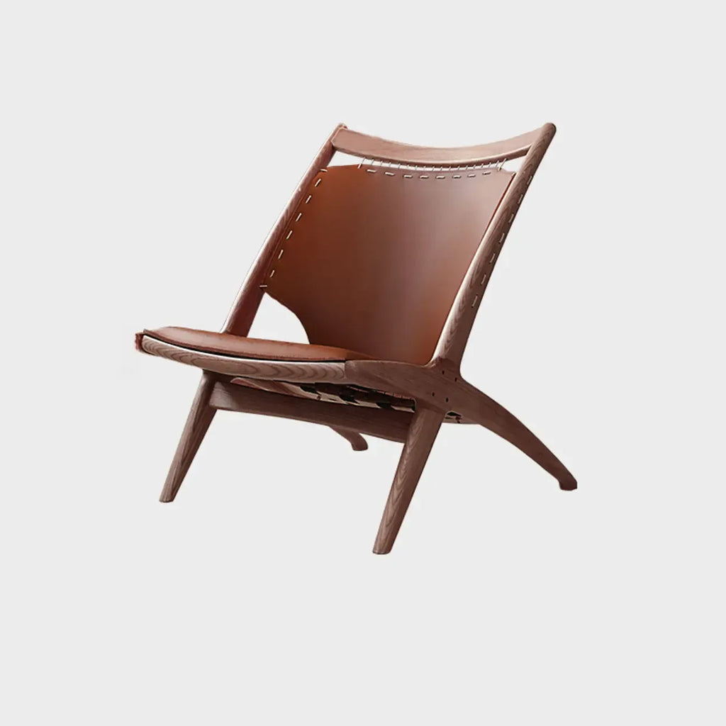 Fauteuil minimaliste en cuir marron selle pour salon