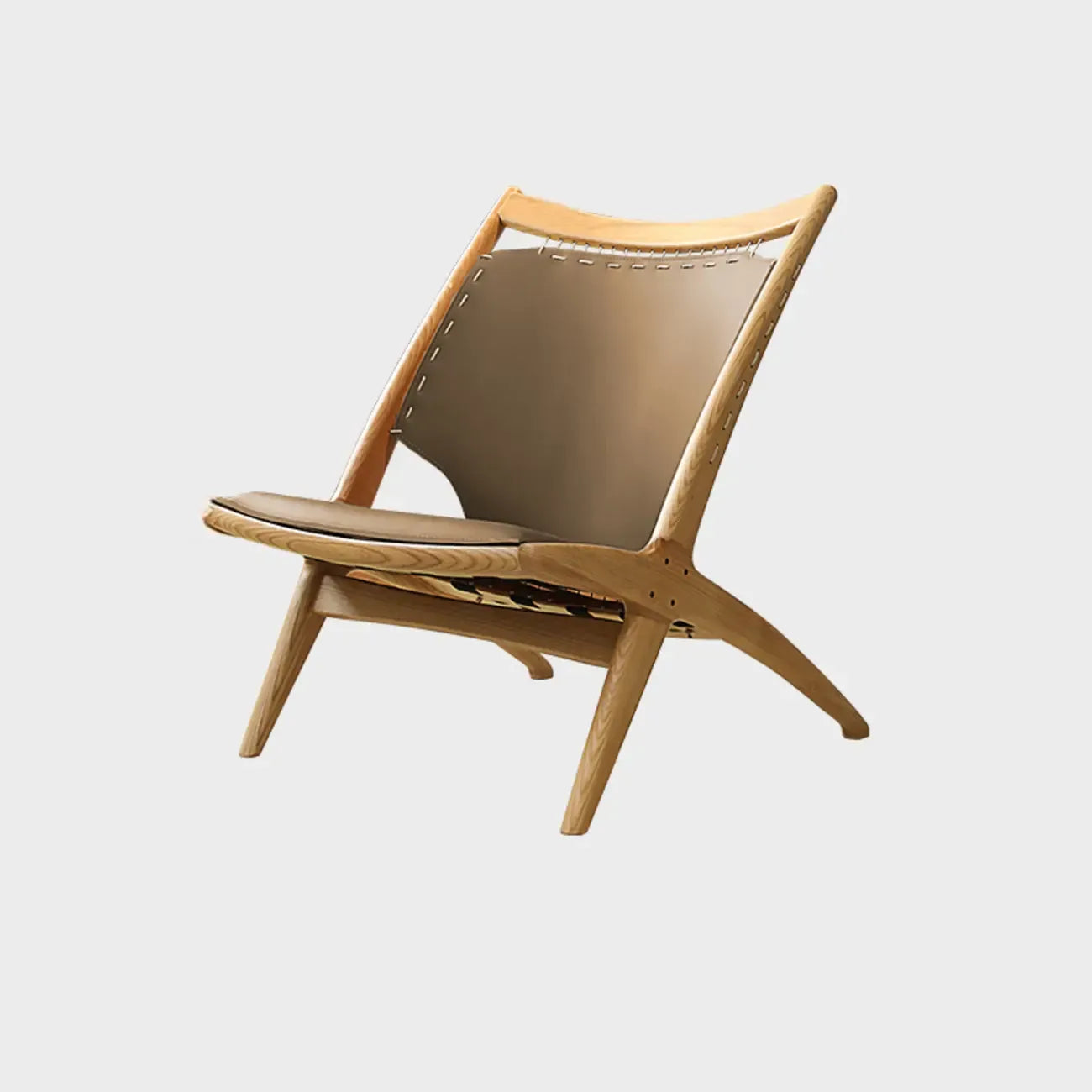 Fauteuil minimaliste en cuir marron selle pour salon
