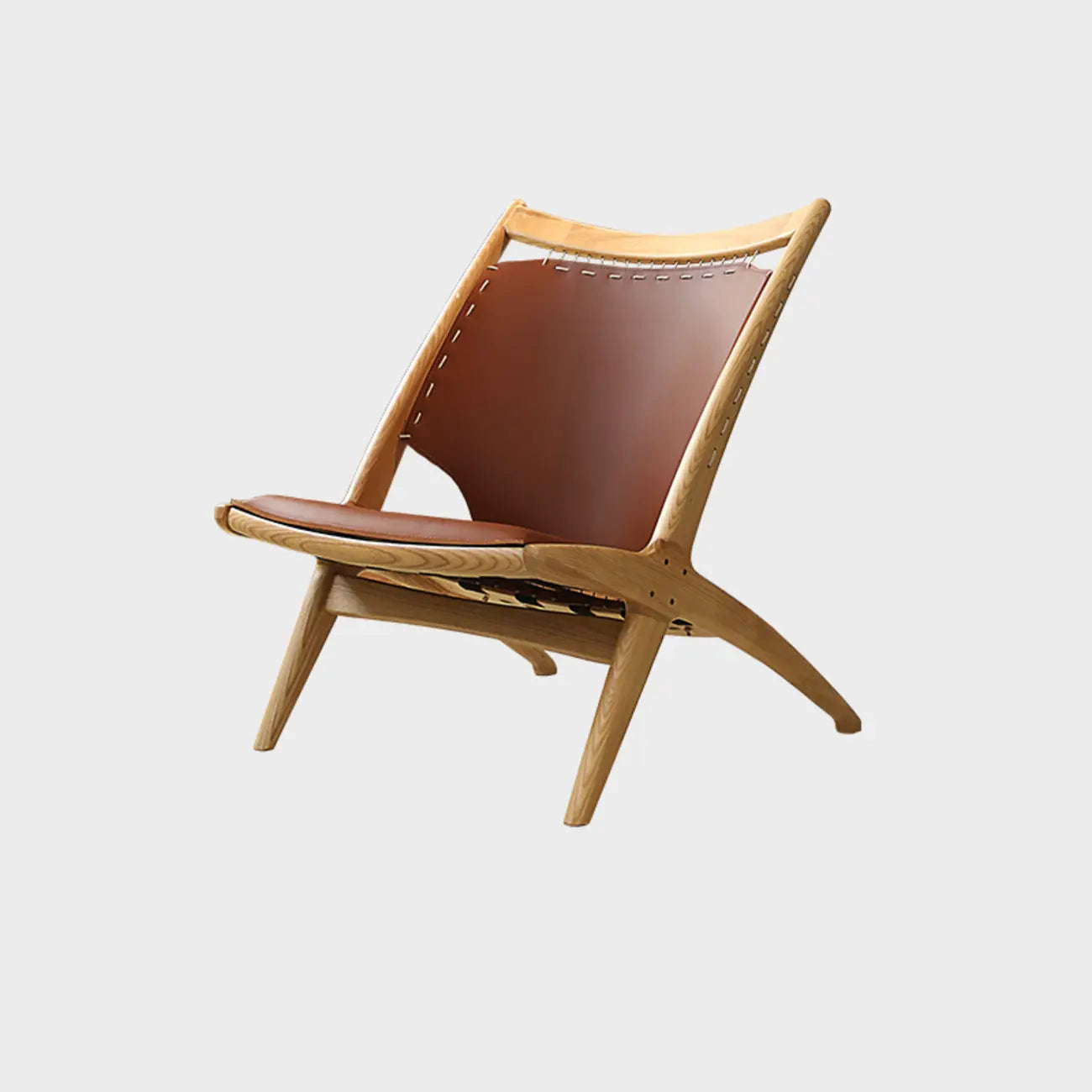 Fauteuil minimaliste en cuir marron selle pour salon