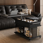 Table basse roulante noire avec plateau relevable et rangement pour salon
