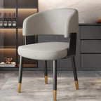 Chaise de salle à manger moderne et glamour en cuir rembourrée