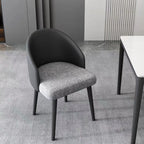 Chaise de salle à manger minimaliste noire rembourrée en tissu, dossier bas