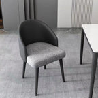 Chaise de salle à manger minimaliste noire rembourrée en tissu, dossier bas